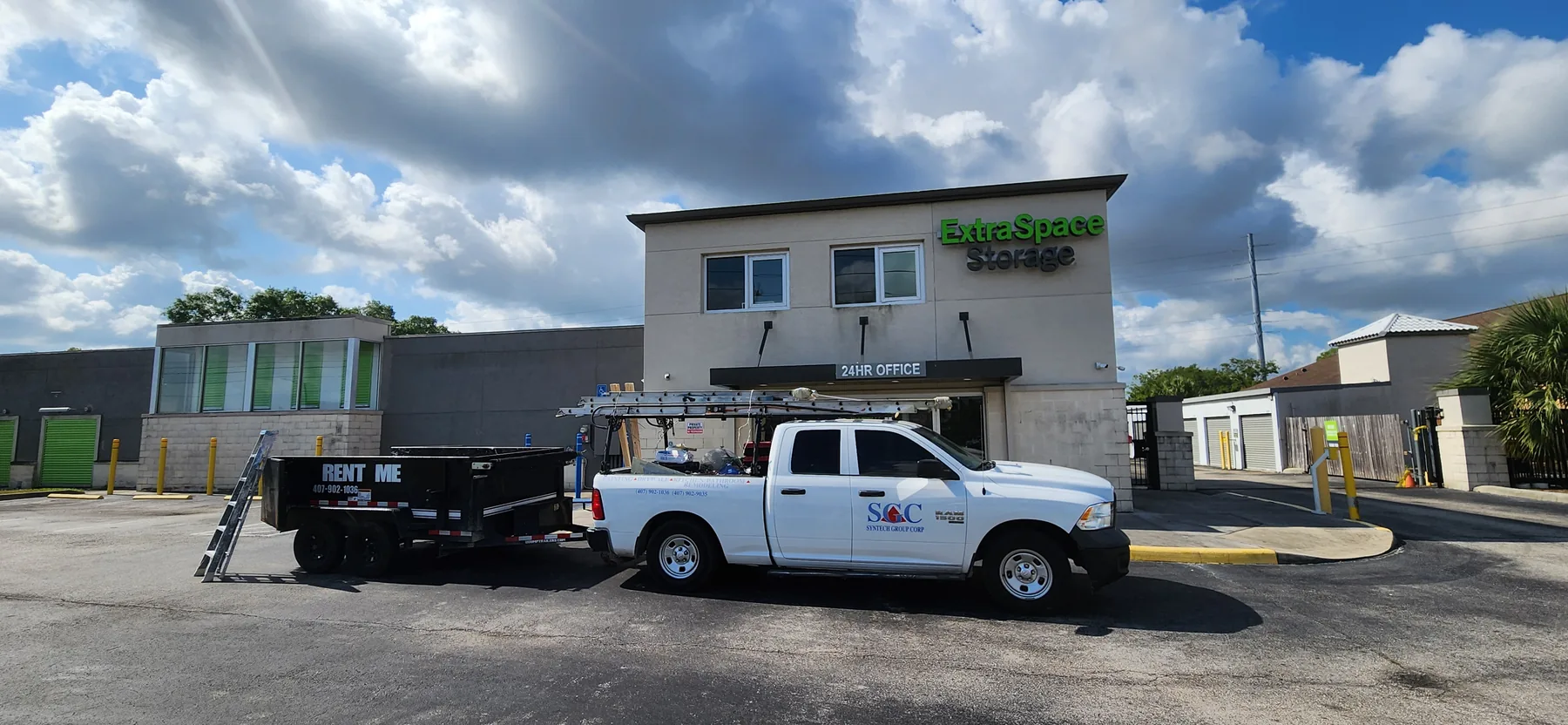 SGC Painting & Facility Services crew truck on site at a commercial storage facility